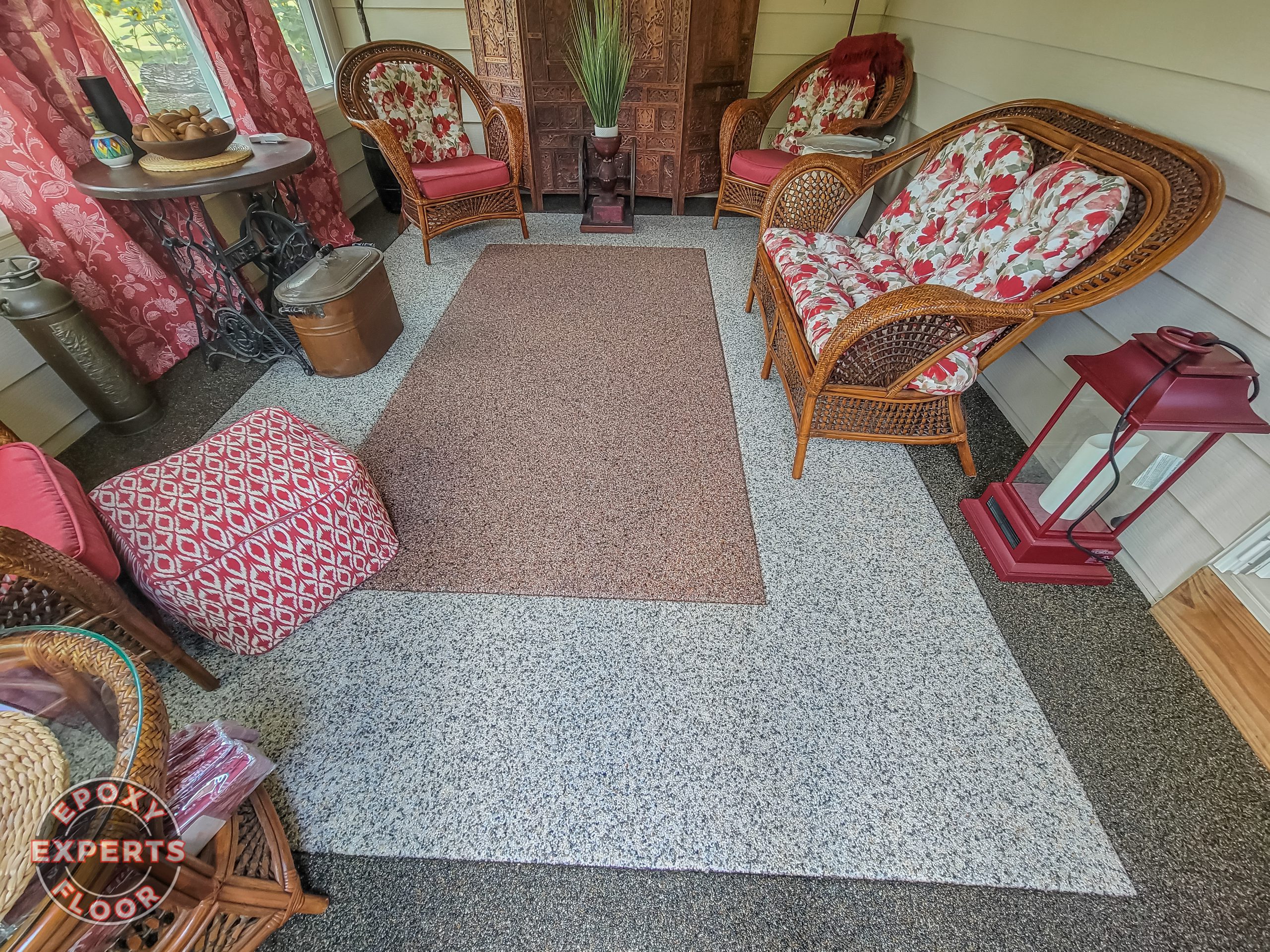 Sun room with epoxy stone floor by the epoxy floor experts